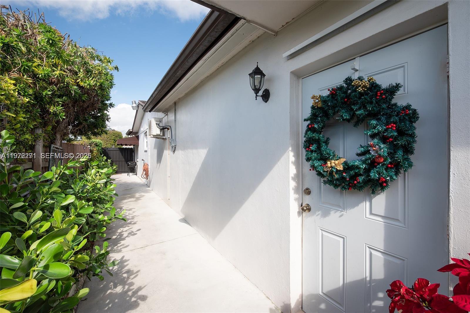 7420 Southwest 31st Street, Unit 2 Miami, FL 33155 - Photo 10 of 10 a vase of flowers sitting on a floor