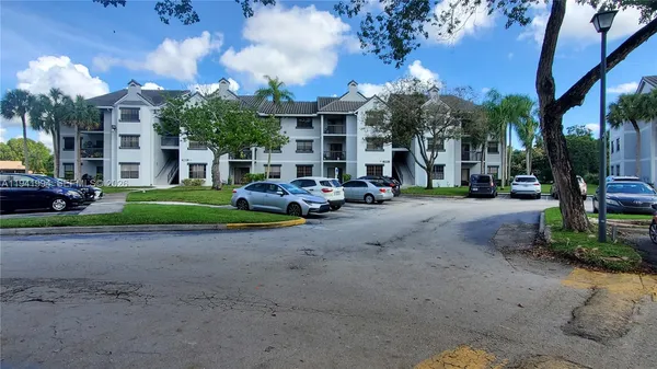 a cars parked in front of a building