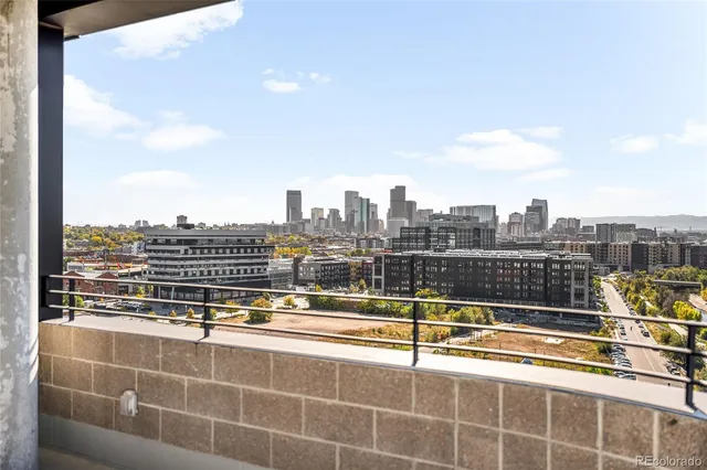 a view of a balcony with city view