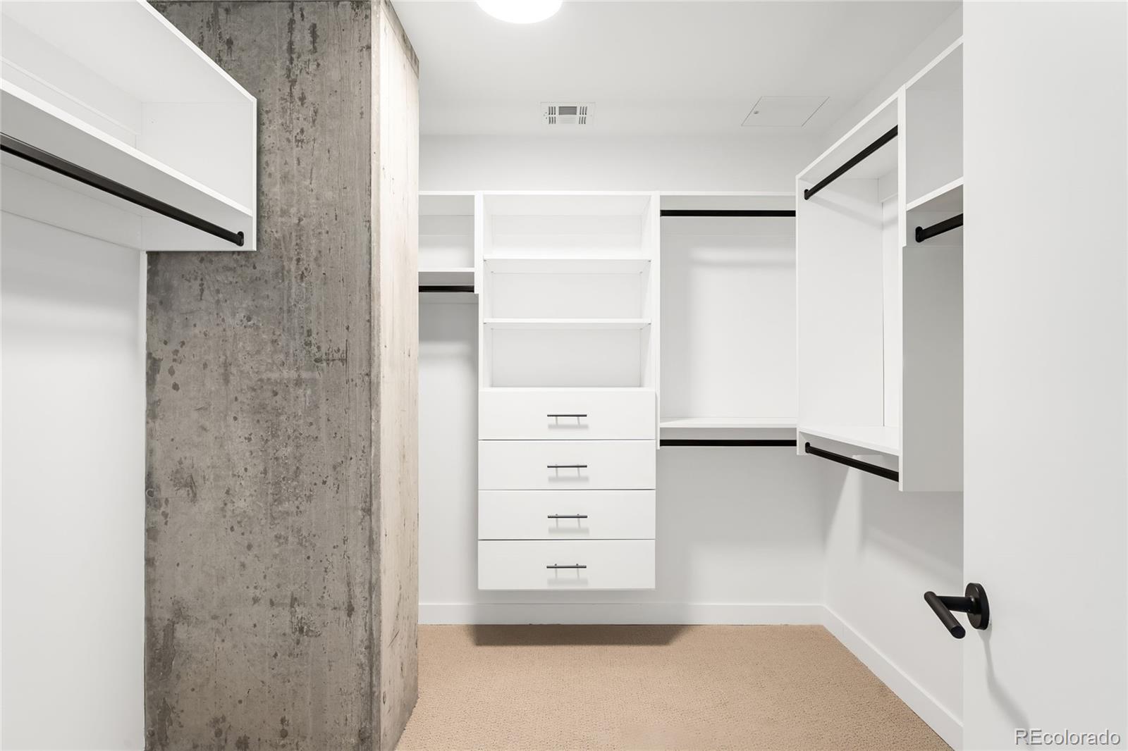 3520 Chestnut Place, Unit 1101 Denver, CO 80216 - Photo 22 of 44 a view of a closet area