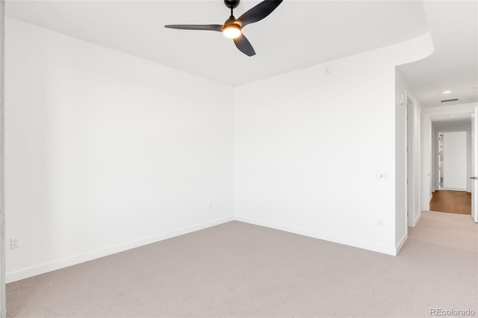 3520 Chestnut Place, Unit 1101 Denver, CO 80216 - Photo 25 of 44 a view of an empty room