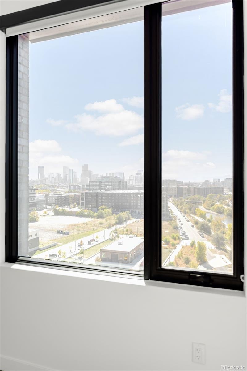 3520 Chestnut Place, Unit 1101 Denver, CO 80216 - Photo 30 of 44 a view of sky from window