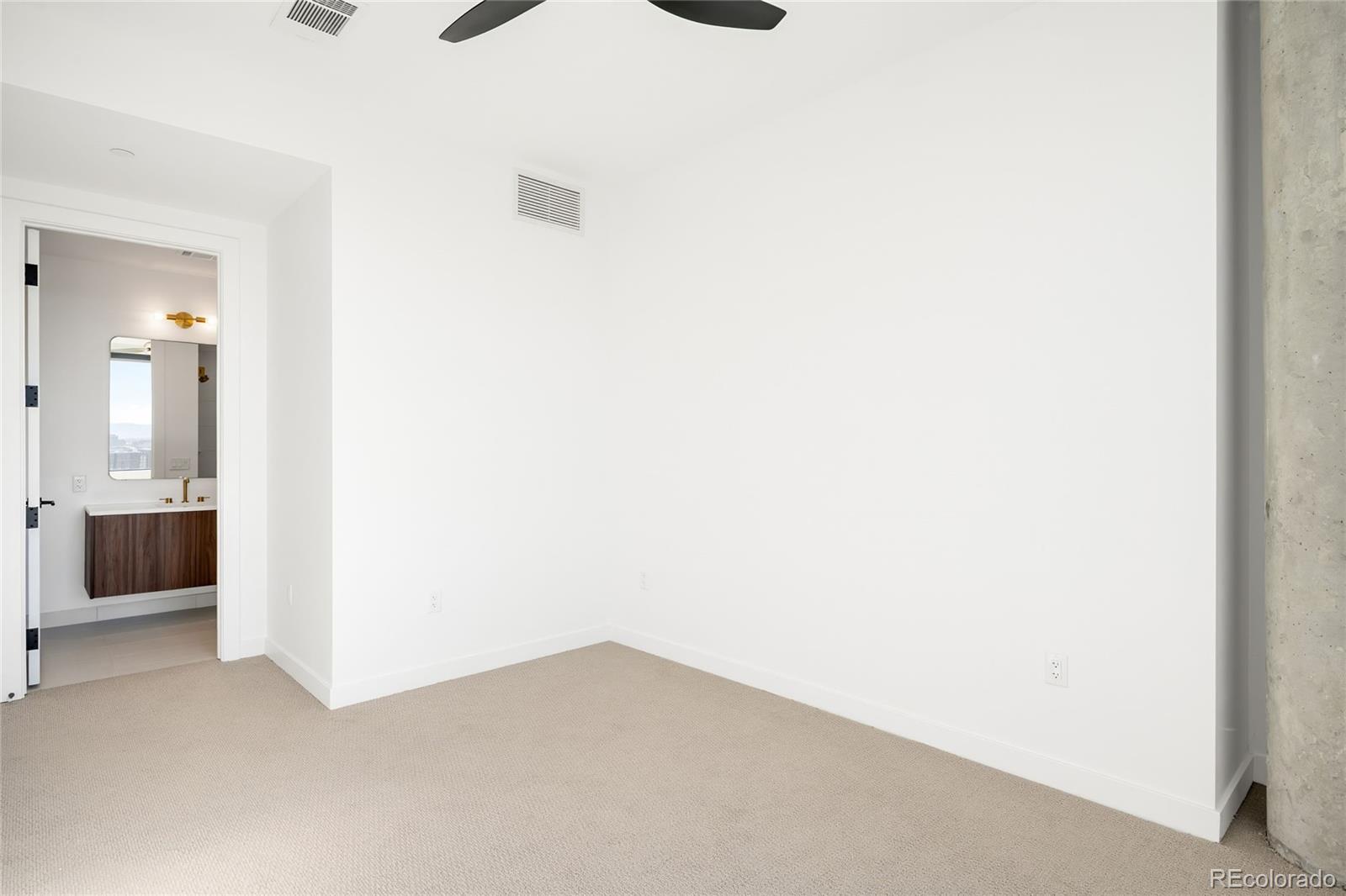 3520 Chestnut Place, Unit 1101 Denver, CO 80216 - Photo 31 of 44 a view of an empty room