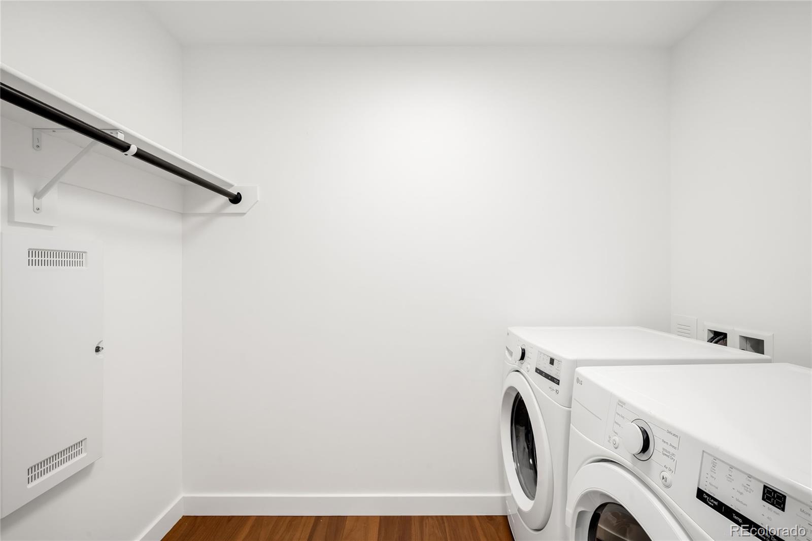 3520 Chestnut Place, Unit 1101 Denver, CO 80216 - Photo 33 of 44 a utility room with dryer and washer