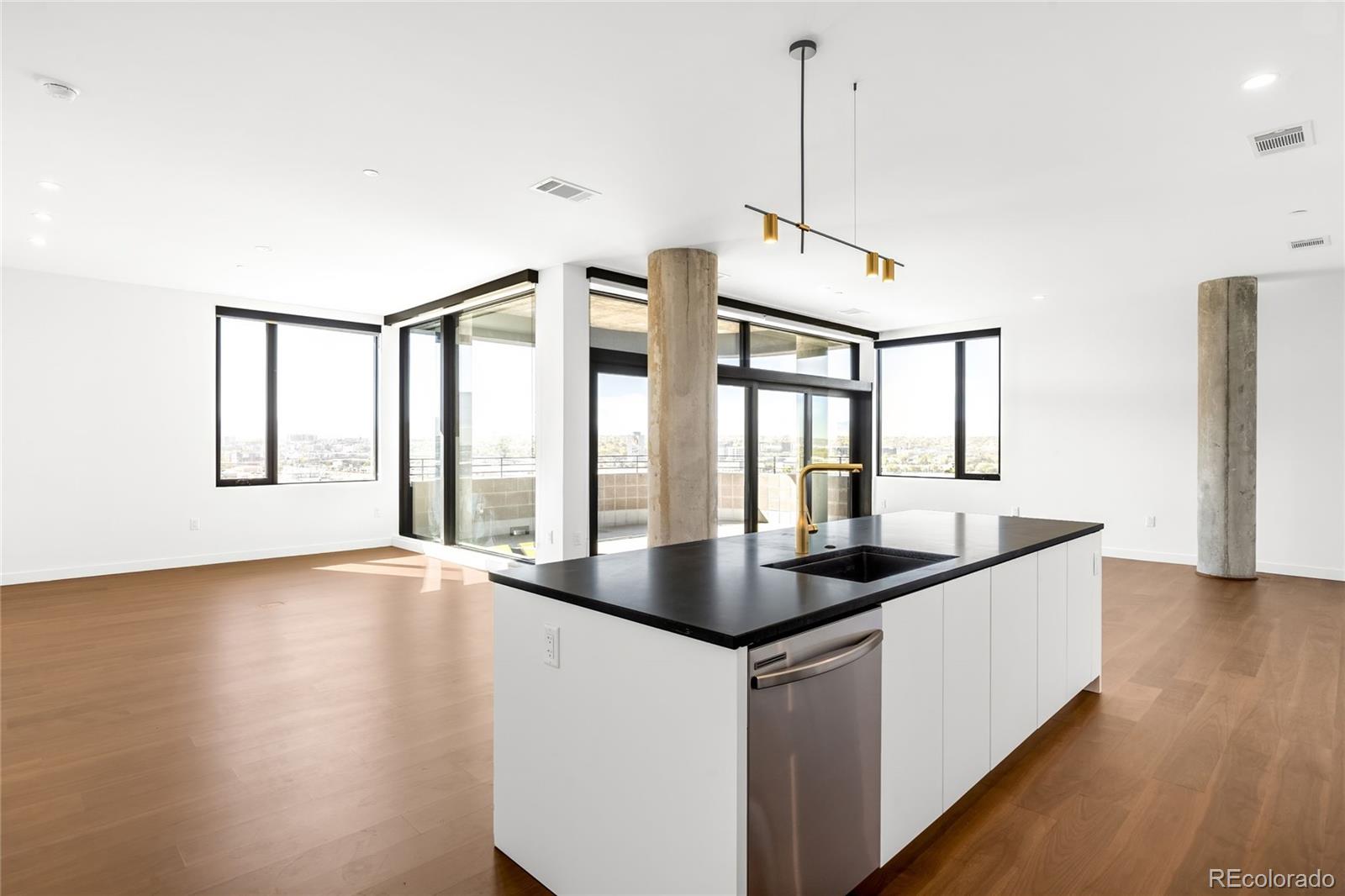3520 Chestnut Place, Unit 1101 Denver, CO 80216 - Photo 7 of 44 a kitchen with sink and window