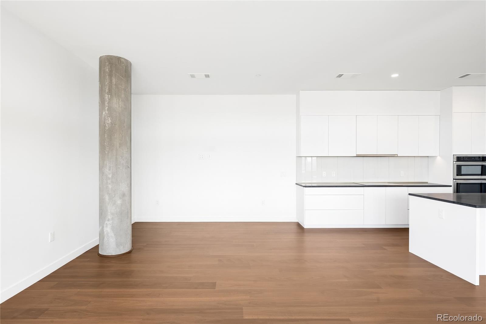 3520 Chestnut Place, Unit 1101 Denver, CO 80216 - Photo 8 of 44 a view of cupboard