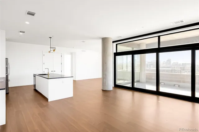 a view of an empty room with window