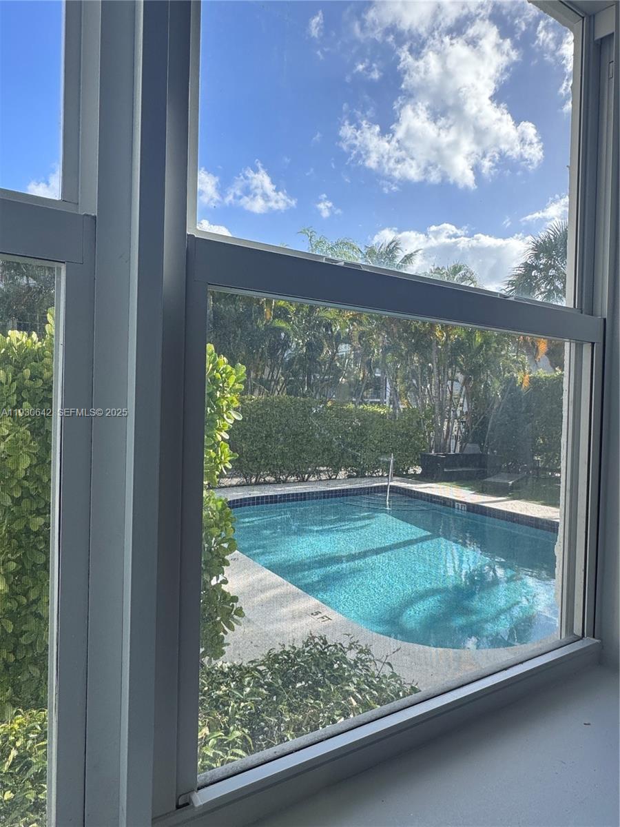 361 Collins Avenue, Unit A2 Miami Beach, FL 33139 - Photo 14 of 25 a view of a porch and garden