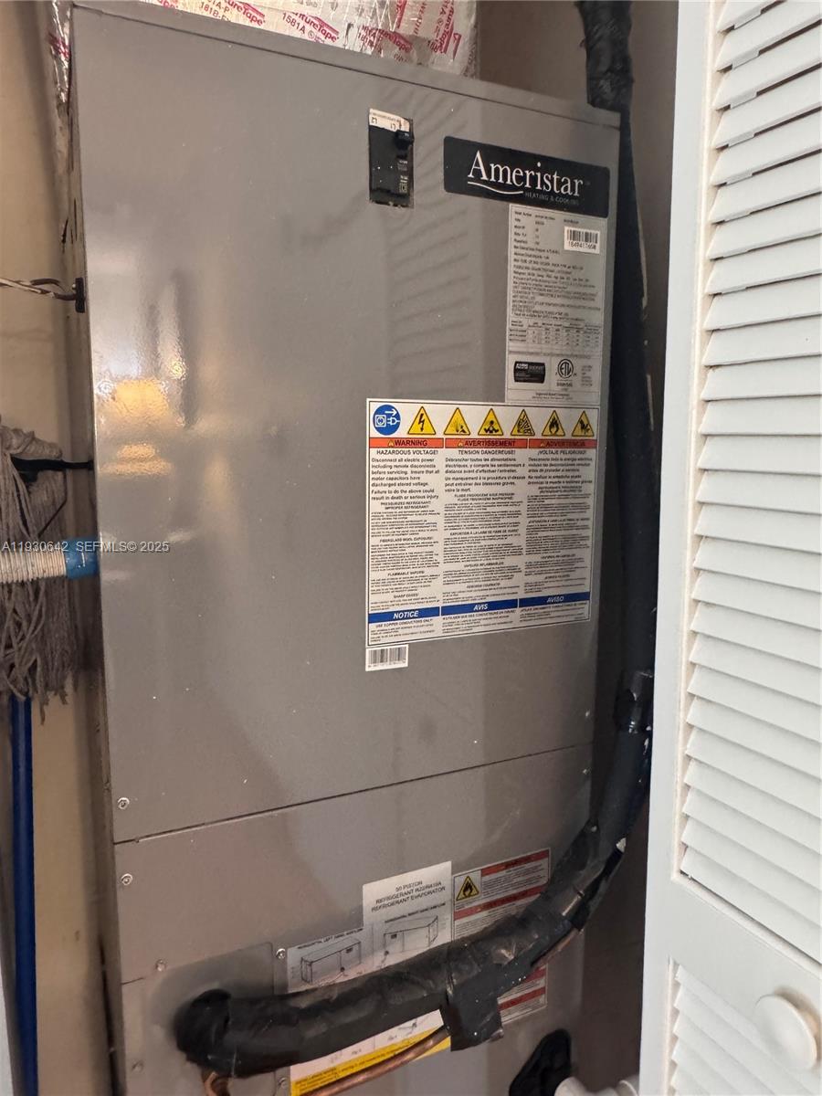 361 Collins Avenue, Unit A2 Miami Beach, FL 33139 - Photo 17 of 25 a bathroom with a sink