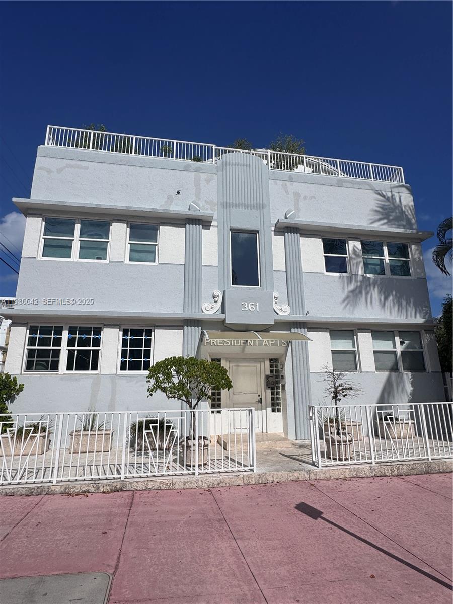 361 Collins Avenue, Unit A2 Miami Beach, FL 33139 - Photo 19 of 25 a view of a building with many windows