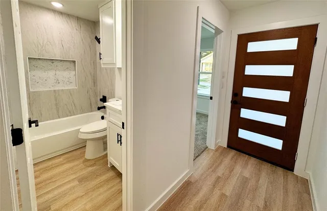 a bathroom with a sink and a toilet