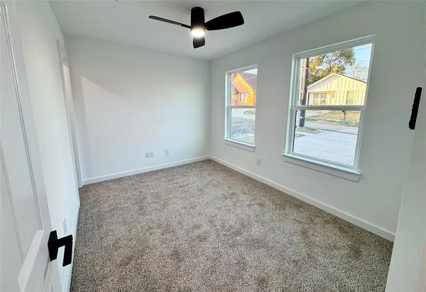 a view of an empty room and window