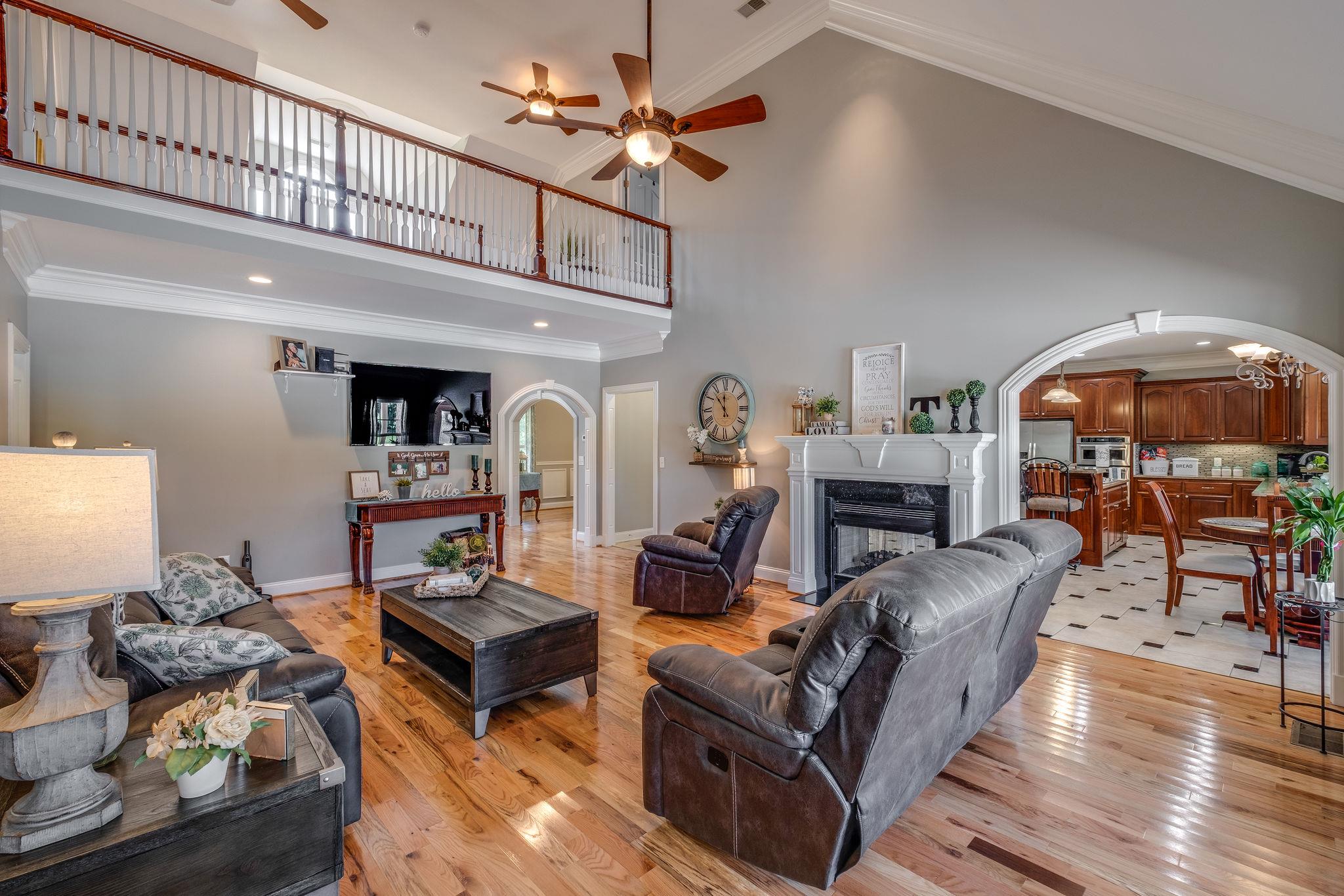 471 Penny Morris Road Portland, TN 37148 - Photo 9 of 33 a living room with furniture and wooden floor