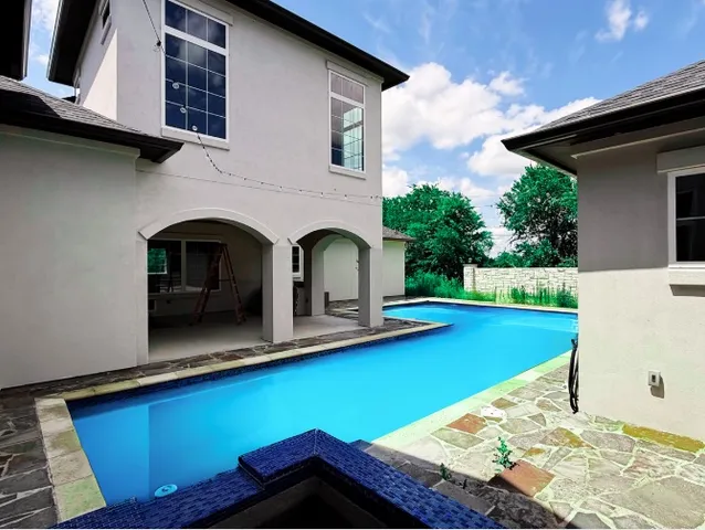 a front view of a house with yard