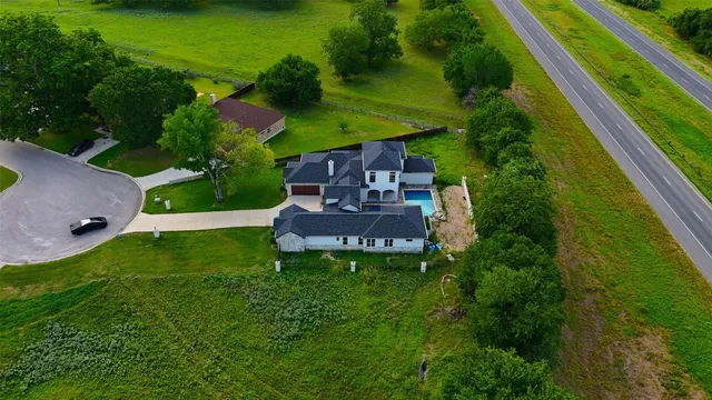 a view of a house with a garden