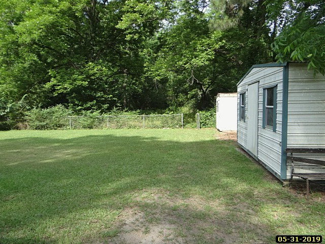 2025 Avalon Road Columbus, GA 31907 - Photo 3 of 15 a view of a house with a yard