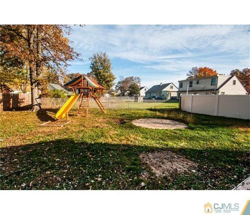 72 Sturgis Road Edison, NJ 08817 - Photo 4 of 15 a view of a large yard