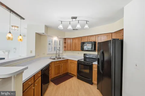 a view of a balcony with wooden floor