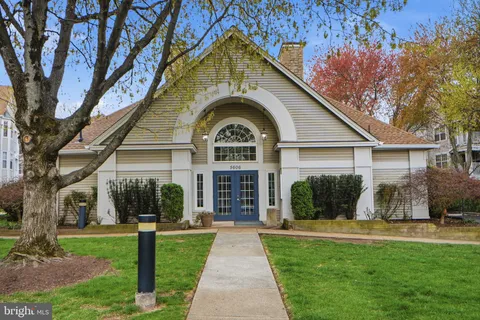 a view of a house with a park