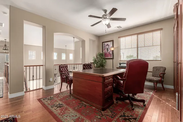 a view of a livingroom with furniture and a flat screen tv