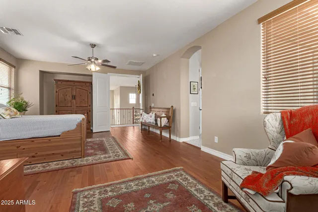 a bathroom with a sink a mirror and a shower