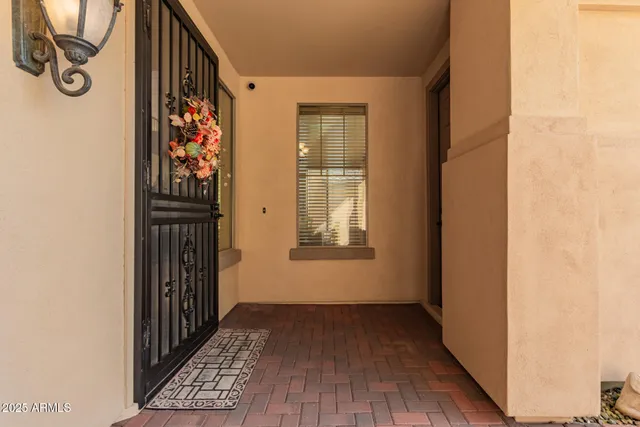a view of entryway with wooden floor
