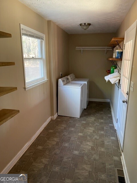 468 Davis Road Fayetteville, GA 30215 - Photo 12 of 13 a view of a room with racks on the wall