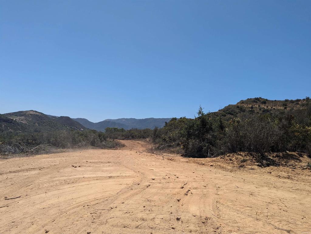 a view of ocean and mountain