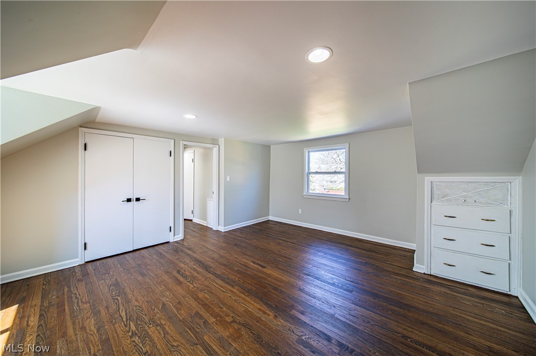 9412 Oakdale Road Parma, OH 44129 - Photo 21 of 38 Bonus room featuring lofted ceiling and dark hardwood / wood-style floors