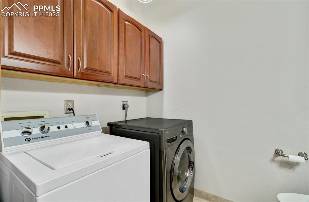 5865 Waterfall Loop Manitou Springs, CO 80829 - Photo 13 of 45 a utility room with dryer and washer