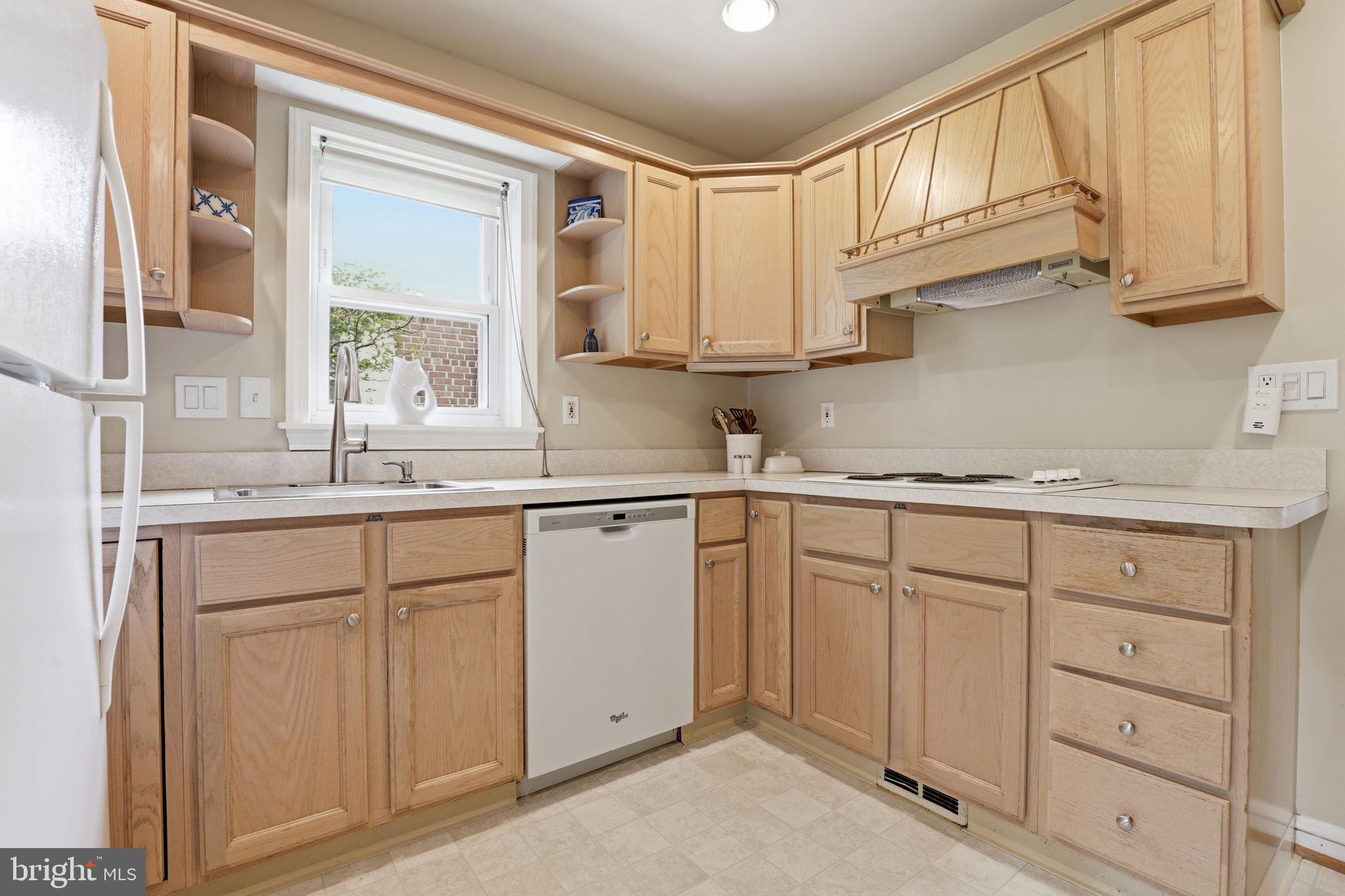 10510 Hayes Avenue Silver Spring, MD 20902 - Photo 12 of 24 Functional kitchen with easy flow