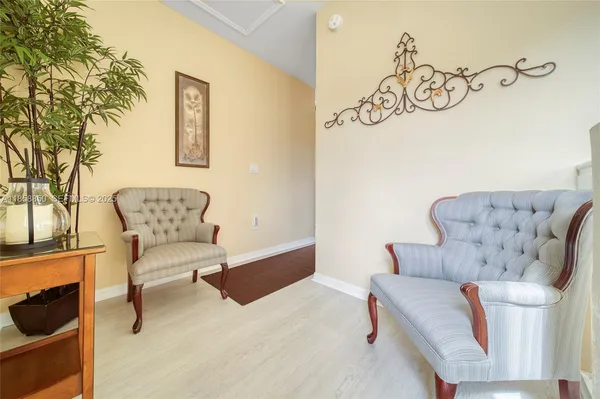 a living room with furniture and a couch