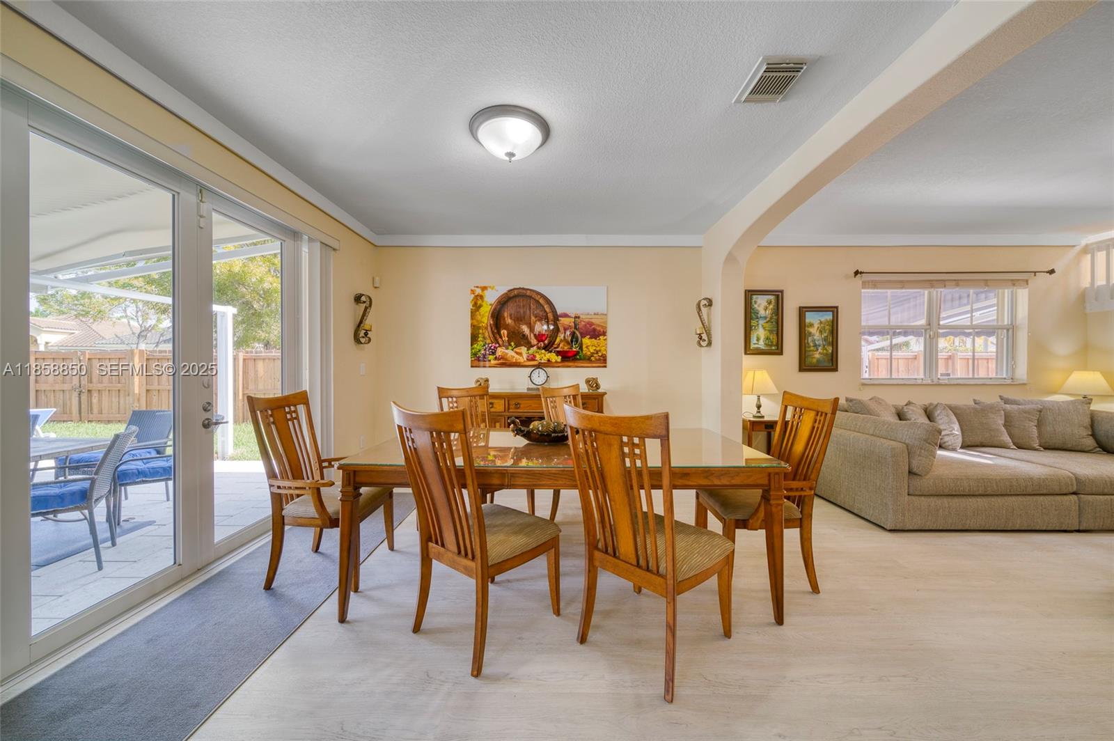 16403 Southwest 79th Lane, Unit 16403 Miami, FL 33193 - Photo 37 of 43 a view of a livingroom with furniture window and outside view