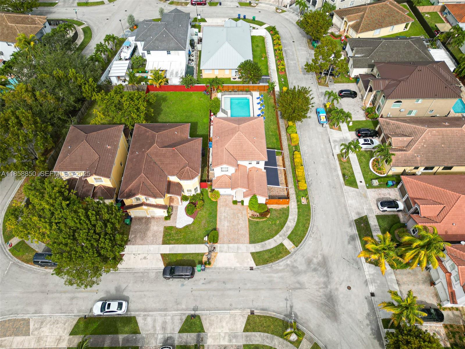 16403 Southwest 79th Lane, Unit 16403 Miami, FL 33193 - Photo 4 of 43 an aerial view of a swimming pool