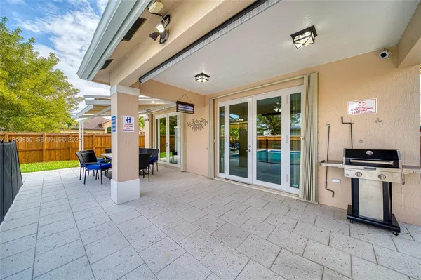 a view of a porch with seating space