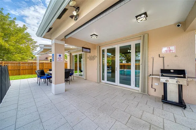 a view of a porch with seating space