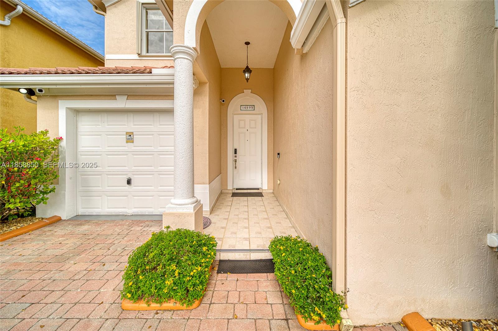 16403 Southwest 79th Lane, Unit 16403 Miami, FL 33193 - Photo 10 of 43 a house with a outdoor space