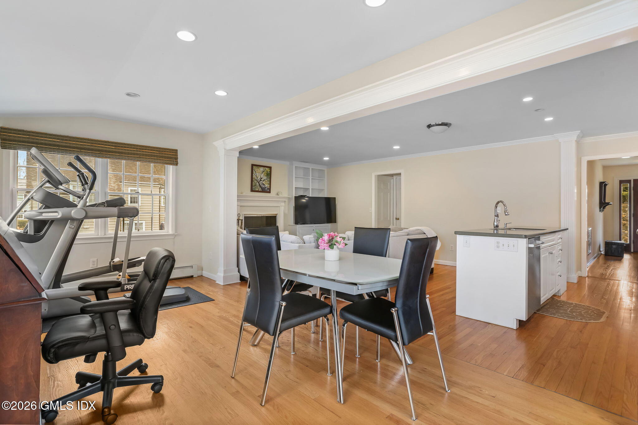 153 Lockwood Road Riverside, CT 06878 - Photo 27 of 58 a view of a dining room with furniture window and wooden floor