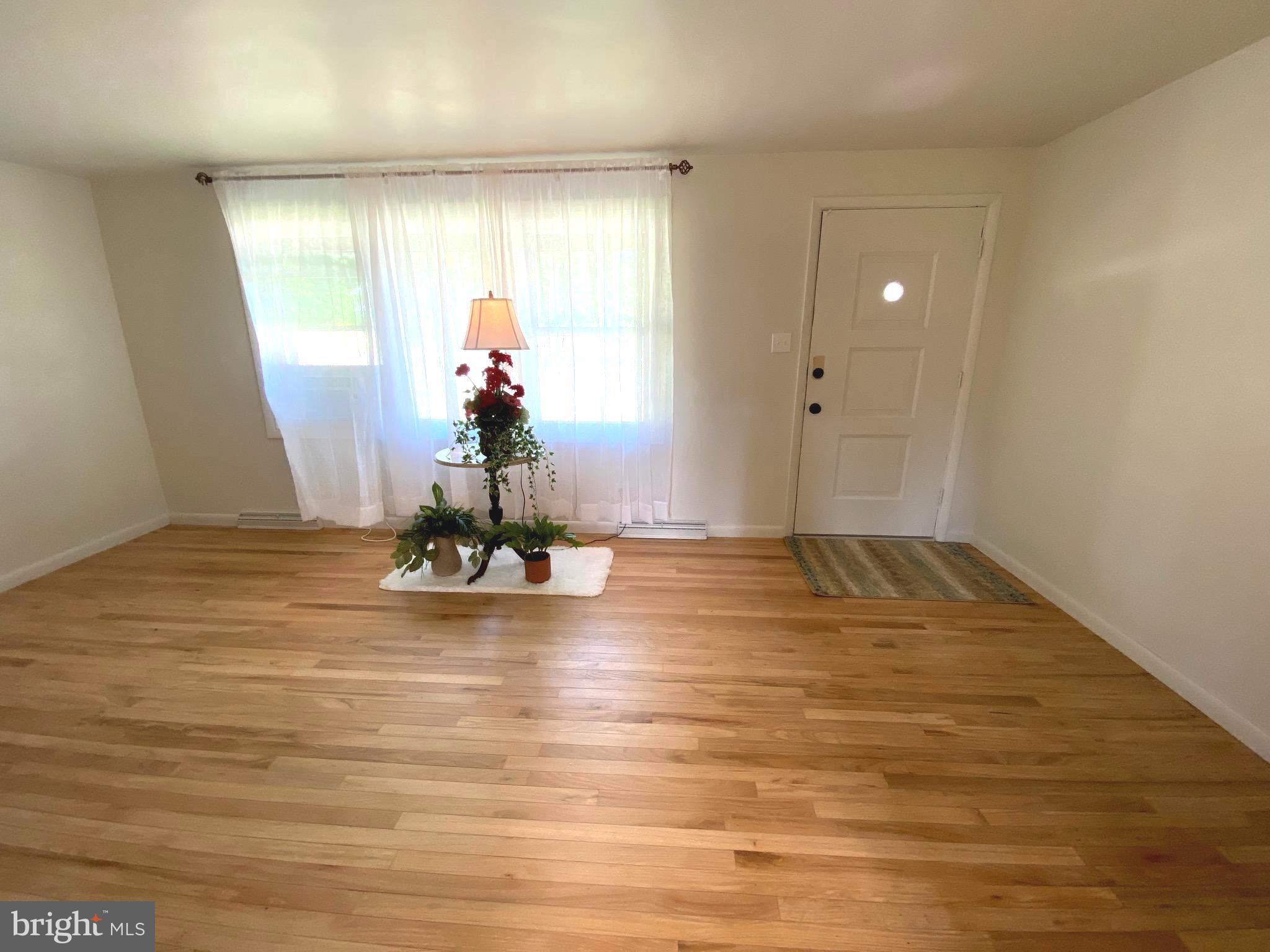 51 Clay Slate Road Oley, PA 19547 - Photo 4 of 12 a view of a room with wooden floor