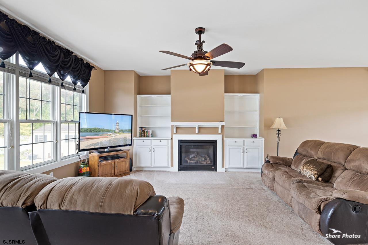 49 Killdeer Hill Road Woodbine, NJ 08270 - Photo 15 of 56 a living room with furniture and a fireplace