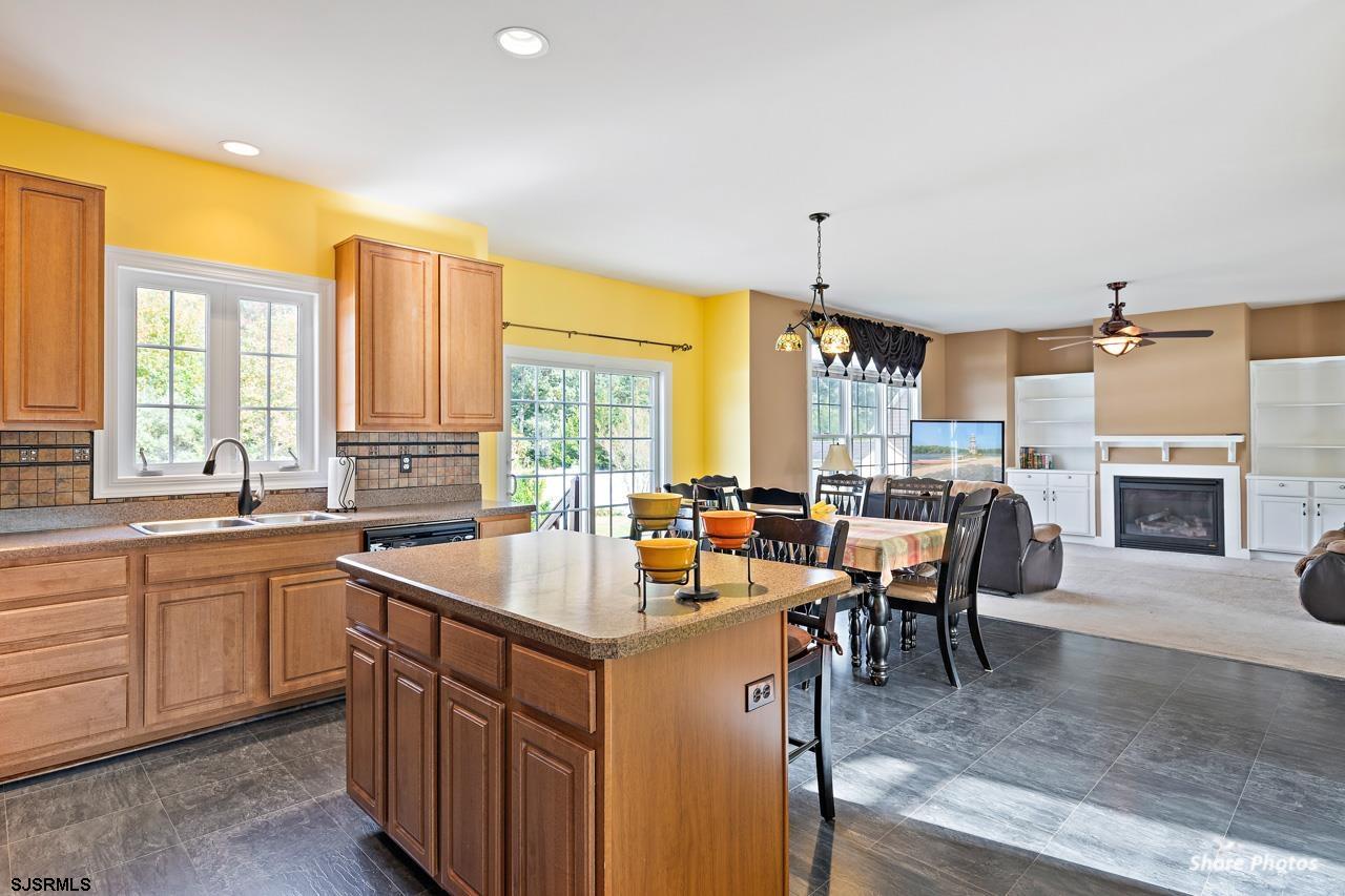 49 Killdeer Hill Road Woodbine, NJ 08270 - Photo 21 of 56 a kitchen with a sink table and chairs