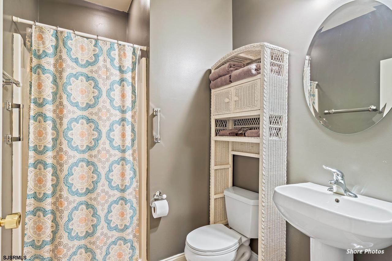 49 Killdeer Hill Road Woodbine, NJ 08270 - Photo 27 of 56 a bathroom with a toilet sink and mirror