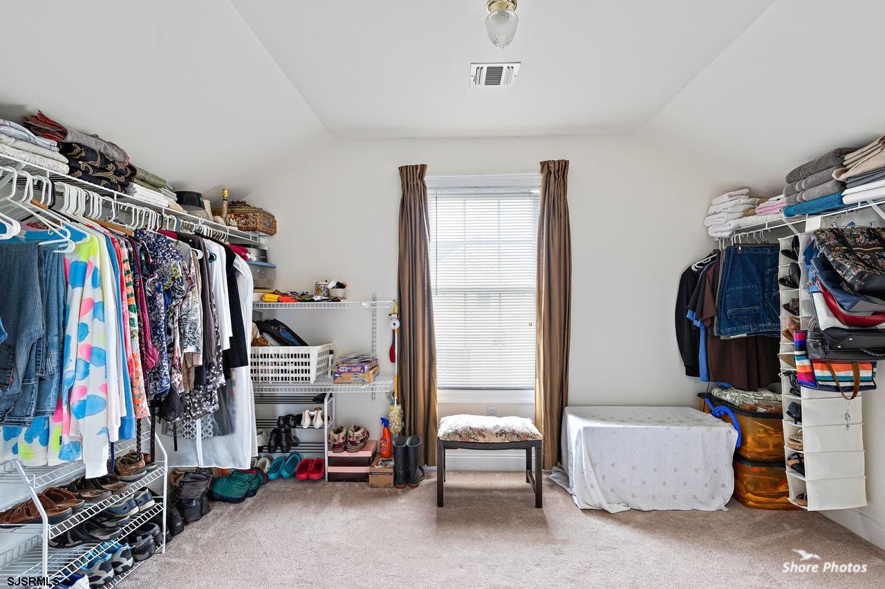 49 Killdeer Hill Road Woodbine, NJ 08270 - Photo 33 of 56 a view of walk in closet with clothes and shoes