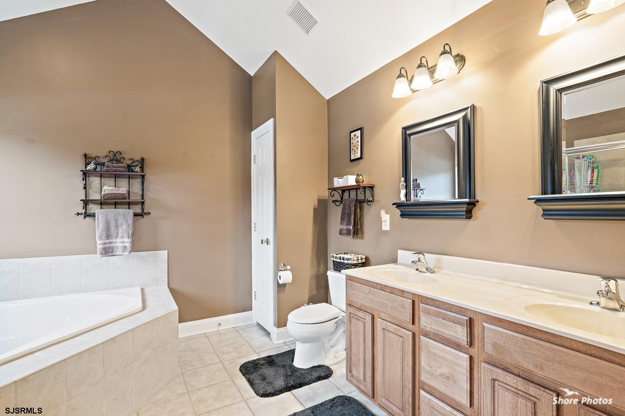 49 Killdeer Hill Road Woodbine, NJ 08270 - Photo 34 of 56 a bathroom with a sink a toilet and shower