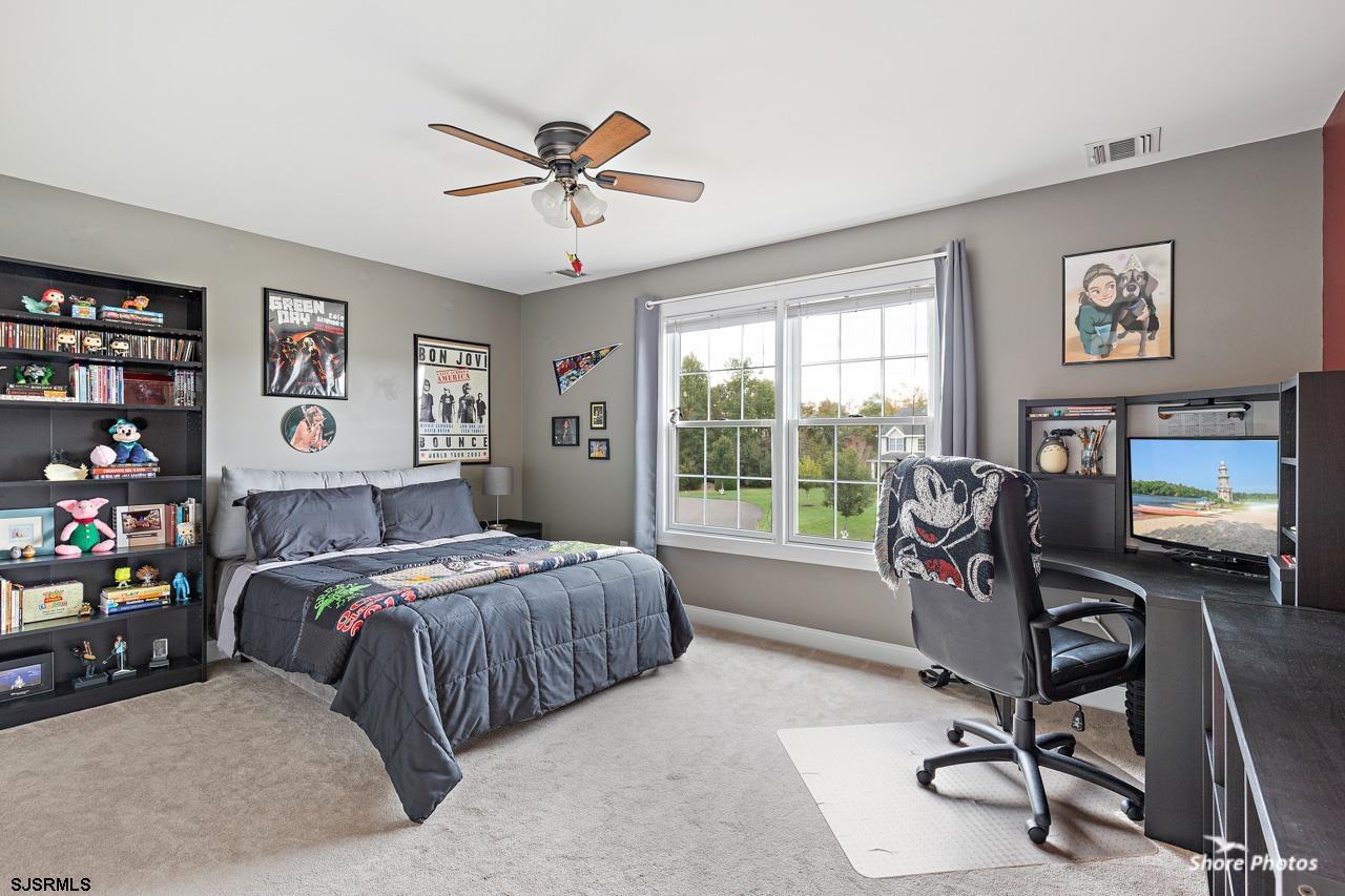 49 Killdeer Hill Road Woodbine, NJ 08270 - Photo 36 of 56 a bedroom with a bed and a desk