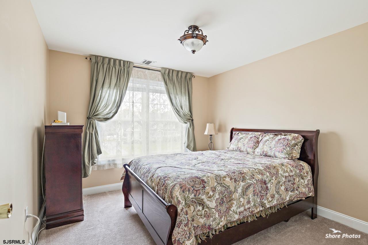 49 Killdeer Hill Road Woodbine, NJ 08270 - Photo 40 of 56 a large bed sitting in a bedroom next to a window