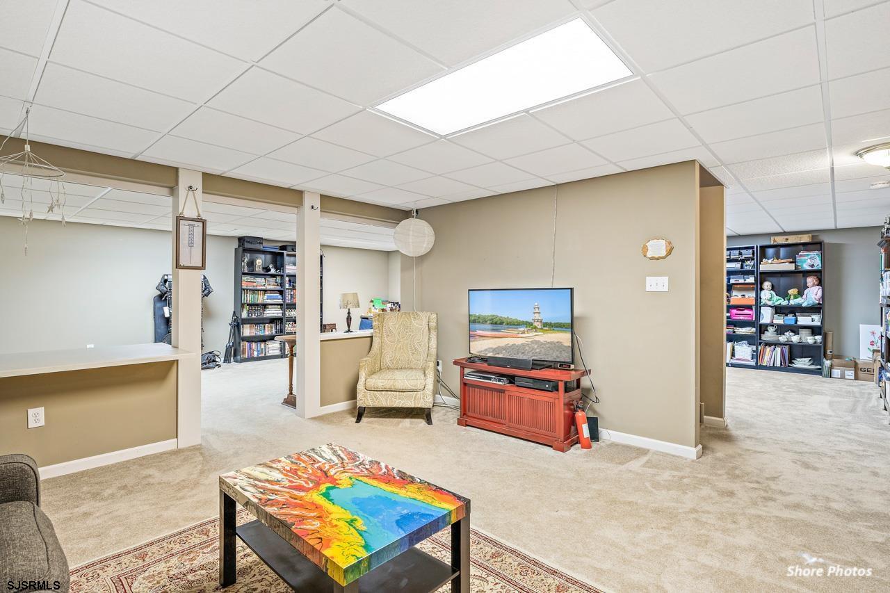49 Killdeer Hill Road Woodbine, NJ 08270 - Photo 46 of 56 a living room with furniture and a rug