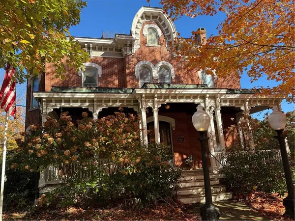 a view of a street with lots of trees