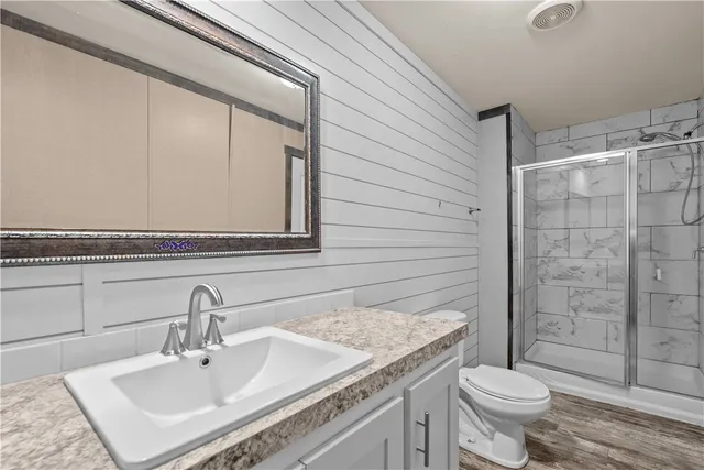 a view of a room with racks on the wall