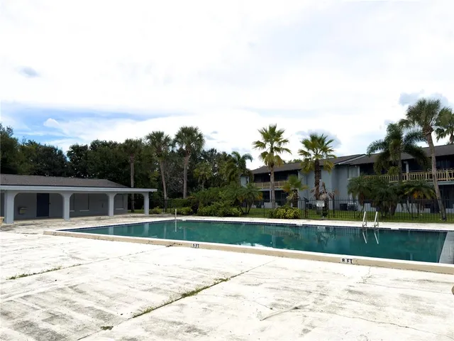 a view of a house with a swimming pool